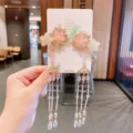 Forcine cinesi fatte a mano con fiori rosa e lunghe nappe di perline per Hanfu - Melo in Fiore