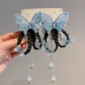 Eleganti mollette per capelli a farfalla blu con trecce nere e nappe floreali - Stile Treccia di Parrucca Farfalla Blu / Blu