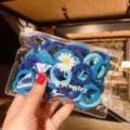 Variety pack of blue elastic hair bands for girls in a clear daisy zip pouch bag - 50Pcs/Bag / Blue Series (14#)