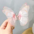 Sweet pink dynamic butterfly hair clip with pearl embellishments for girls - Light Pink