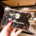 Set of premium black high-elastic hair ties in a transparent daisy print zip bag - 50Pcs/Bag / Black (10#)