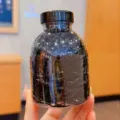 Disposable high elasticity black hair ties in a clear bottle for girls and toddlers - 1283H Black