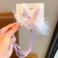 Cute handmade rabbit ear hair clip featuring purple flower and soft white feathers for girls - Purple