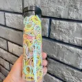 Small colorful elastic hair ties for babies and kids in a clear plastic storage tube - Jar / 300 Pieces/Pack / Warm Bamboo Orange