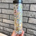 Bulk pack of colorful baby hair rings and elastic rubber bands in a clear storage tube - Jar / Spiral 300 Pieces / Macaron Color