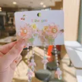 Fermaglio per capelli cinese tradizionale con fiori e lunghe nappe di perle rosa - Smeraldo e Oro Stratificati