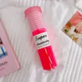 Pack of seamless high elasticity pink and hot pink hair ties in a clear bottle - 30 PCS / Pink Series