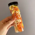 Colorful hair elastics set for kids and girls in a transparent storage tube holder. - 100 Pieces/Jar / Orange Yellow Series (4#)