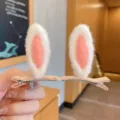 Cute plush bunny ear hair clips for girls, perfect for sweet fringe styling - Orange Red Rabbit Ear
