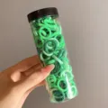 Assorted shades of green elastic hair bands for girls in a clear portable storage tube - 100 Pieces/Jar / Green Series (6#)