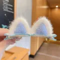 Pair of cute fuzzy cat ear hair clips in light blue and white plush for girls hair styling - Blue Cat Ears