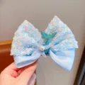 Sparkling blue mermaid tail and starfish sequin bow hair clip accessory for young girls - Blue Bow Hair Clip