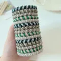 Set of 15 thickened woven high-elasticity hair bands in green and silver tones. - 15 Pieces/Pack / Green Canister