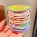 Multicolor high elasticity hair elastics set for children in a clear storage bottle - 48 Pieces per Set / Light Colors