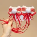 Detail of Chinese New Year red bow hair clip with white fur pom-pom and tassels - Satin Long Tassel Style (D169---15)