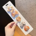 Cute baby girl cloth-covered hair clip set with flower, bow, carrot, and rabbit designs - Orange Embroidered Carrot (BD3975)