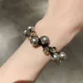 Elegant dual-use hair tie and bracelet featuring grey pearls and amber faceted beads - Silver Gray Pearl Hair Tie
