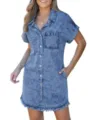 Detail view of the stylish short sleeve denim shirt dress with chic frayed hem and pockets. - S / Denim Blue