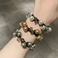 Elegant pearl and crystal dual-use hair tie bracelet in white, gold, and grey colors - Braided Pearl Rhinestone 3-Piece Set