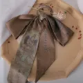 Elegant brown silk hair ribbon bow with traditional pattern and golden flower hair stick - Buddhist Style Ribbon Rose Hair Stick