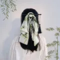 Elegant Hanfu style hair stick with green bamboo pattern ribbon bow and black tassel - Bamboo