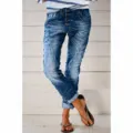 Women washed blue denim jeans with multi-button closure and rolled cuffs for casual daily wear. - XS / Medium Blue
