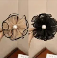 Detail of elegant 8cm flower mesh hair claw clips with pearl center in black and beige. - Black and Champagne