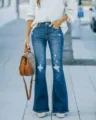 Women distressed flare jeans detail, dark wash denim pants with ripped knee and wide leg. - S / Blue