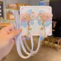 Handmade Hanfu flower hair clips with faux pearls and long ribbons in pink and blue - Dawn Pink