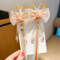 Elegantes pinzas para el cabello Hanfu con flores y borlas largas de estilo tradicional. - Oreja de Conejo Naranja