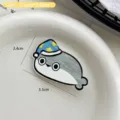 Cute Sacabambaspis cartoon fish hair clip with blue star hat on a white plate - 5.5cm x 3.4cm / Fish with Hat