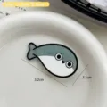 Cute cartoon Sacabambaspis fish hair clip with 5.2cm by 3.1cm dimensions shown - 5.2cm x 3.1cm / Dazed Fish