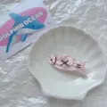 Cute pink marble Sacabambaspis fish meme hair clip with funny cartoon expression - Pink Fish Hair Clip