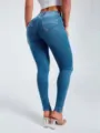 Detailed view of women's stretch high-waisted slim skinny jeans showing back fit. - S / Light Blue