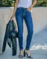 Women's dark blue skinny denim pants detail shot, slim fit streetwear fashion styling. - L / Blue