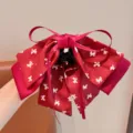 Pince à cheveux nœud rouge pour filles avec motif papillon blanc imprimé - Nœud sur Fond Rouge