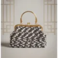 Sac à main vintage en tweed noir et blanc avec fermoir baiser doré et poignée métal - Noir