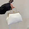 Elegant vintage white woven leather handbag featuring a rhinestone frame and luxury pearl clasp - White