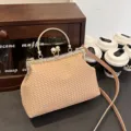 Elegant apricot woven leather shell handbag with vintage pearl clasp and rhinestone frame - Khaki