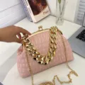 Elegant pink pleated shell bag featuring chunky gold chain handle and detachable strap - Pink