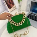 Elegant green pleated shell handbag featuring a chunky gold chain and shoulder strap - Green
