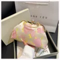 Elegant floral jacquard shell clutch bag with gold chain strap and ring handle - Pink