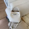 Elegante cremeweiße Beuteltasche mit Litschi-Muster und Silberverschluss für den Alltag - Einzelne Tasche / Weiß