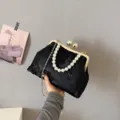 Elegant black floral embroidery evening clutch bag with pearl handle and gold chain - Black