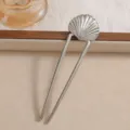 Detailed view of a silver seashell U-shaped hair fork with elegant texture. - Shell Style (F015) / 12.3x3.1cm / Silver