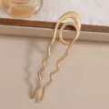Detailed view of elegant gold U-shaped hairpin with hammered wavy texture design - Wave Style (F015) / 12.7x3.5cm / Gold