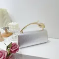 Silver woven PU evening clutch bag with elegant gold tulip-shaped metal handle - Silver
