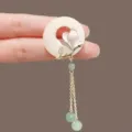 Detailed view of Neo-Chinese jade ring brooch with magnolia flower and green tassels - Magnolia (XZ25158)