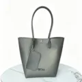 Detailed view of grey TPU jelly tote bag set featuring a matching zippered pouch - Black