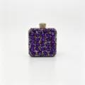Close-up of luxurious purple square evening clutch bag with full rhinestone embellishment - 12.5x7x15cm / Purple